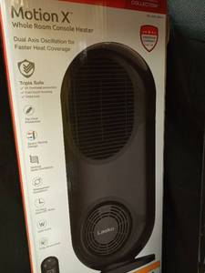lot 1124 image: Lasko Heating Space Heater, 27 Inch, BlackOscillates With remotePowers on & heats up - Retail $43