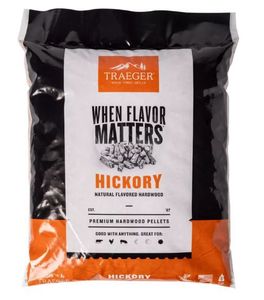 lot 1133 image: Traeger Hickory Wood Pellets. Pellets are great for naturally enhancing Beef, Chicken, Pork, and Veggies with full bodied bold flavor.  - Retail $20