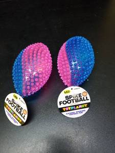 lot 1184 image: (2) Spike Footballs LED Flashing bouncing fun - Retail $11