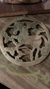 lot 2744 image: Metal Horse Racing Scene Trivet