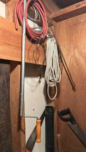 lot 8745 image: Garden Tool Collection with Hand Saws and misc parts pictured