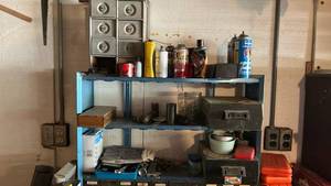 lot 8753 image: Industrial Metal Storage Cabinet with Blue Shelving Unit All contents on top of the wood cabinet including shelves and cubbies