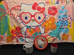 lot 3705 image: Hello Kitty Collectible Bundle with Mugs Tin and Beach Towel