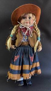 lot 73 image: Cowgirl Porcelain Doll with Western Outfit 16 Inches Tall