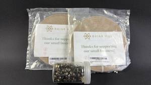 lot 91 image: Briar Hill Upholstery Tack Strip (2) 20 Yards Natural Chip Strip with Jar of Upholstery Tacks
