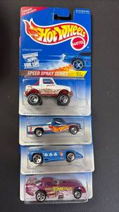 lot 156 image: (4) Hot Wheels Die Cast Cars in Original Packaging