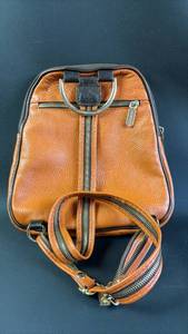 lot 175 image: Valentina Burnt Orange Italian Leather Convertible Backpack Art 1200, Features Pebbled Leather Can Be Wworn As Backpack, Shoulder Bag, or Crossbody.