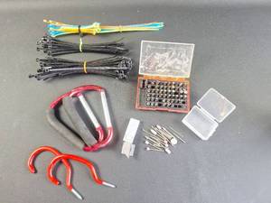 lot 188 image: Mixed Tool Lot with Screwdriver Bits, Zip Ties, and Carabiners