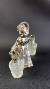 lot 203 image: HTF  Vintage Dutch Girl with Salt and Pepper Shaker (Baskets)