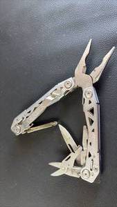 lot 208 image: Gerber Suspension-NXT Multi-Tool, featuring a slim butterfly design.