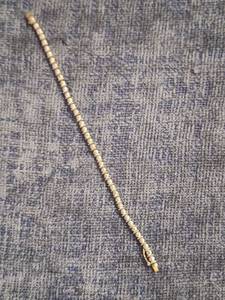 lot 1 image: 9.25 Silver Tennis Bracelet with Diamond Accent Stones