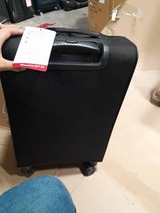 lot 11601 image: Pirouette NXT SS 55 Black Rolling Suitcase with Carbon Fiber Handle