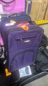 lot 11626 image: Rockland Mariposa 19 Expandable Spinner Carry-on Purple