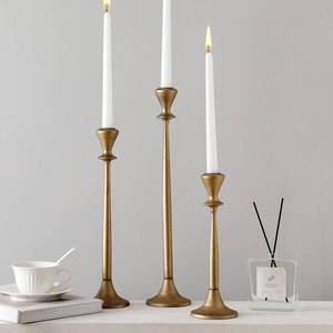lot 56682 image: 3pcs Vintage Gold Iron Taper Candlestick Holder Tall Brass Candle Holder Decorative Candle Stand, Candlestick Holder for Wedding, Dinning, Party (Antique Brass) - Retail $40