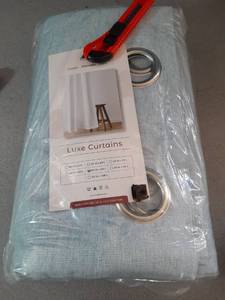 lot 57 image: Luxe Light Blue Grommet Curtain Panel 52x90 Inches - Retail $15