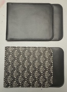 lot 109 image: Black Leather Wallet Set with Decorative Pattern and Shoulder Straps