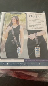 lot 126 image: Save the Girls Clip & Go Phone Wristlet with Matching Strap - Black