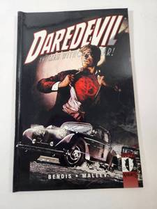 lot 162 image: Daredevil The Man Without Fear Trade Paperback by Bendis and Maleev