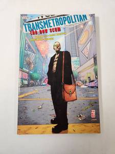 lot 243 image: Transmetropolitan The New Scum Trade Paperback Book