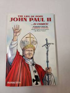lot 256 image: The Life of Pope John Paul II Comic Biography by Papercutz