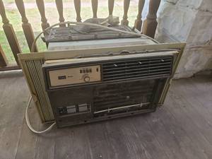 lot 9002 image: Carrier Siesta 5400 BTU Window Air Conditioner - Powered On - Compressor Powered On - Put out Cool Air