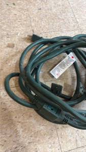 lot 5034 image: Green Outdoor Extension Cord with Multiple Outlets