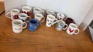 lot 5111 image: Mixed Coffee Mug Collection Holiday and Novelty Designs
