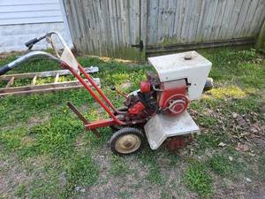 lot 7037 image: Stick Shift Roto-Spader Walk-Behind Garden Tiller