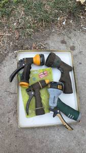 lot 7044 image: Garden Hose Nozzle and Sprinkler Set