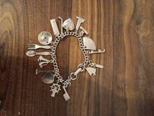 lot 9 image: Sterling Silver Multi Charm Bracelet with Nautical and Kitchen Themed Charms