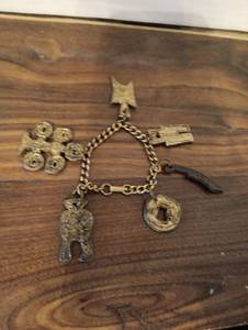 lot 11 image: Brass Charm Bracelet with Chinese Coins and Animal Figures