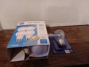 lot 13 image: Energy Efficient CFL Light Bulbs Set, 2 out of 4 bulbs and 1 appliance bulb.