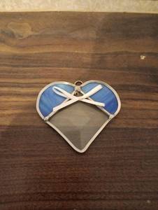 lot 33 image: Stained Glass Heart Suncatcher with Blue and Clear Panels