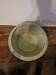 lot 44 image: Handmade Green Ceramic Bowl with Scalloped Edge