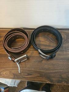 lot 84 image: Italian Coated Leather Belts with Metal Buckles - 2 sizes.