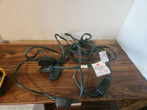 lot 95 image: Green indoor Extension Cord with Multiple Outlets