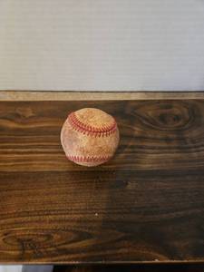lot 99 image: Used Baseball with Red Stitching