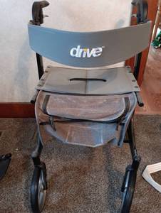 lot 141 image: Drive Medical Rollator Walker with Seat and Storage Basket
