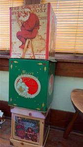 lot 1004 image: Christmas Storage Boxes Set with Saturday Evening Post and Holiday Designs