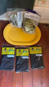 lot 3002 image: Party Supplies Bundle - Foil Shreds, Yellow Plates, and Black Tableclovers