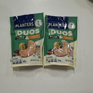 lot 1671 image: 2 pack PLANTERS Nut Duos Peppercorn Pistachio and Parmesan Flavored Cashew, 5 oz Resealable Bag
