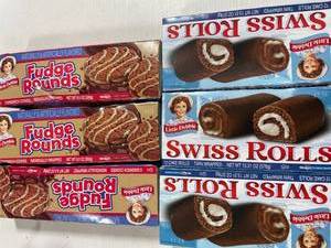 lot 2022 image: 6 Boxes of Little Debbie Dessert Pastries. 3 Boxes Swiss Rolls and 3 Boxes Fudge Rounds.