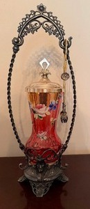 lot 104 image: Antique James W. Tufts Quadruple Plate Cranberry Glass Pickle Castor