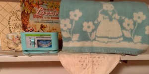 lot 415 image: Vintage Babys Millions Bank, Thermometer, Blanket and Books