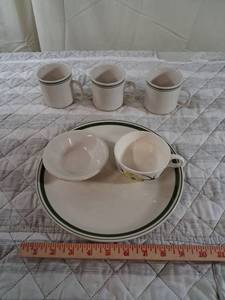lot 4 image: Ceramic Dinnerware Set with Green Trim 10 in plate 3 - 3in coffee cups
