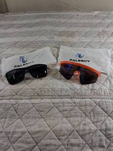 lot 55 image: PALESHY Sports Sunglasses Set - Black and Orange Frame Pair