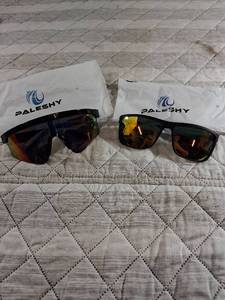 lot 63 image: PALESHY Sports Sunglasses Set of 2 with Carrying Cases