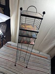 lot 159 image: 36 in tall Black Wire DVD Display Rack with Classic Western Movie Collection