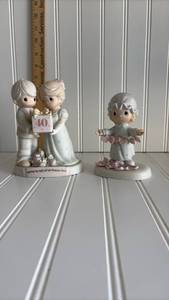 lot 124 image: Precious Moments 40th Anniversary Figurine Set