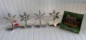 lot 153 image: Holiday Time Christmas Stocking Holders